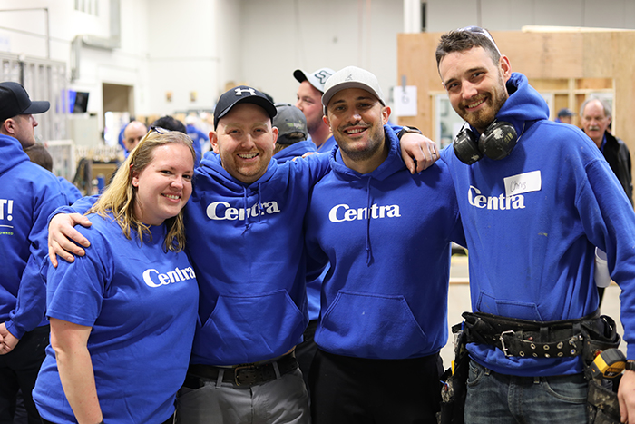 Centra Windows team working together to learn and train about vinyl windows in BC